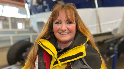 Stuart Howells/BBC Ali Norman