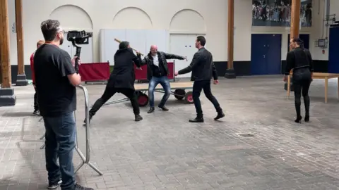 BBC Four people rehearsing a fight scene