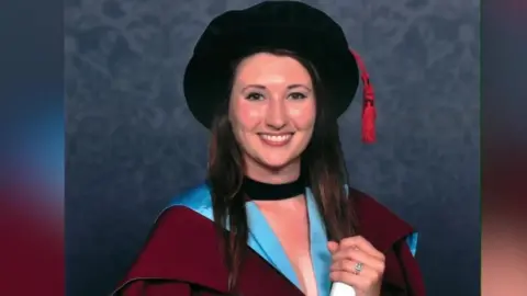 Handout Catherine Pointer after receiving a degree