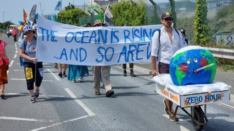 BBC The Extinction Rebellion protest outside Valero fuel depot in Plymouth