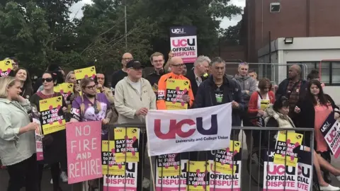 Teachers protesting outside college