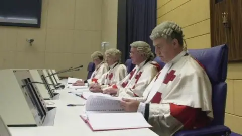 PA (From left) Lockerbie judges Lord Abernethy, Lord Coulsfield, Lord Sutherland - the presiding judge - and Lord MacLean