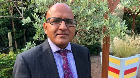 Shaun Whitmore / BBC Sanjay Kaushal