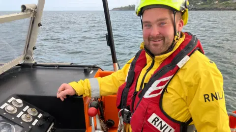 Behind the wheel of the Mersey Class is Niall McMurray