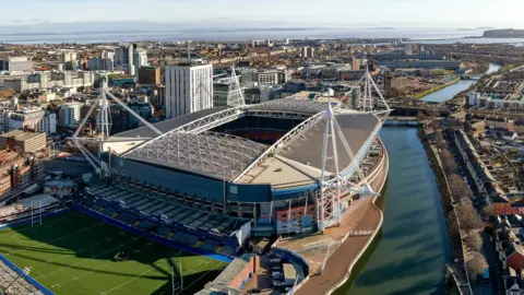 Aerial view of Cardiff city centre, Principality Stadium, Arms Park and down to the Bristol Channel