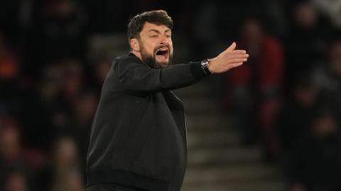 Russell Martin manager of Southampton shouts directions to his team.