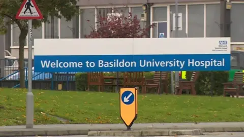 BBC Basildon University Hospital sign