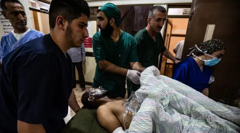 Getty Images Patient being treated in a hospital in northern Syria