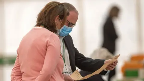 PA Two count staff examined a ballot paper in Inverness