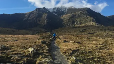 Mikey Kay Spencer Kay walking in the mountains