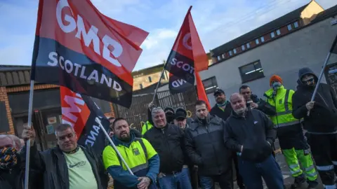 Getty Images Refuse workers in Glasgow took strike action in November 2021