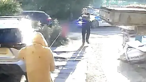 Suspect being Tasered by police
