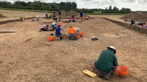 BBC Archaeologists at work at the site near Driffield