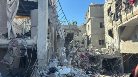 Remains of buildings destroyed successful an Israeli aerial onslaught adjacent Rafik Hariri University Hospital successful confederate Beirut, Lebanon (22 October 2024)