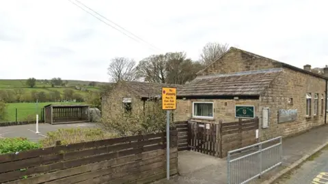 A photo of the outside of Fountains Earth CE Primary School