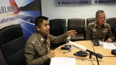 Reuters Immigration chief Maj-Gen Surachate Hakparn address media at Suvarnabhumi Airport