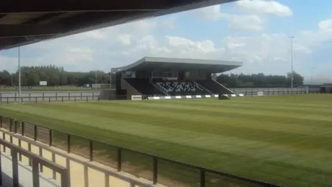 corbytownfc.co.uk The Steel Park football stadium with stands around the edge of the pitch