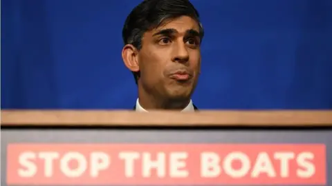 PA Media Rishi Sunak speaking at a news conference