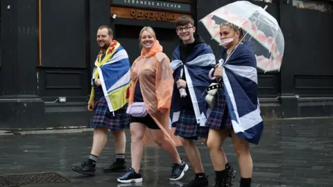 PA Media fans in Leicester Square on Friday