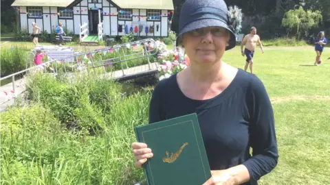 Susie Parr with her book The Lake about Henleaze Swimming Club