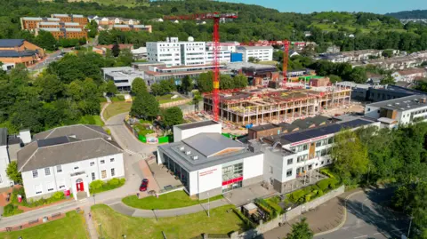 Getty Images An aerial view of a university campus which includes building work and cranes