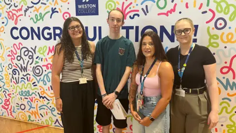 A group of people stood in a line
