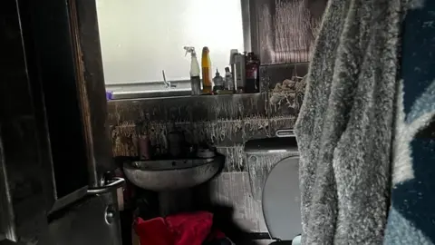 TiaHenderson Smoke damage in Tia Henderson's bathroom.