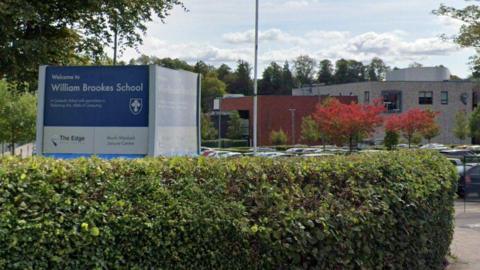The entrance sign for William Brookes school