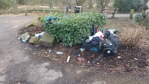 Durham County Council An illegal fly-tip at Memorial Park, South Moor, in Stanley, where large items such as kitchen ware and sports equipment have been discarded in the park's bushes. It is an eye-sore as the rubbish has been left in the decorative bushes. 