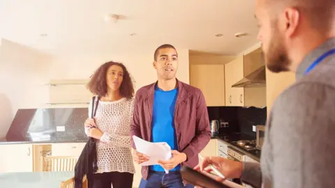 Getty Images A mates  talking to an property  cause  during a level  viewing