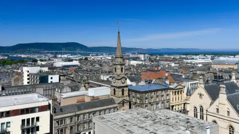 Getty Images A view across Inverness city centre towards the Longman, Kessock Bridge and the Black Isle on a sunny day