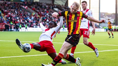 : Airdrie's Kanayo Megwa and Partick Thistle's Harry Milne