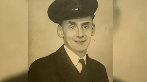 A sepia photograph of Arturo Fanconi in his Royal Navy outfit