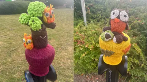 Whinfield Yarn Bombers Two photos, one of a bollard with a knitted tree on top with orange and yellow birds. The other has an owl.