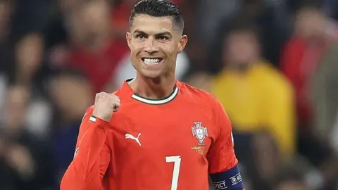 Cristiano Ronaldo clenches his first in celebration
