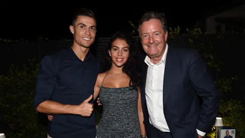 Getty Images Cristiano Ronaldo, Georgina Rodriguez and Piers Morgan