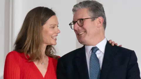 Getty Images Victoria Starmer, British Prime Minister Sir Keir Starmer, Amelie Derbaudrenghien and Belgian Prime Minister Charles Michel watch a ceremony on the South Lawn of the White House to celebrate NATO's 75th anniversary at the annual summit on July 10, 2024