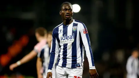 Ousmane Diakite in action for West Brom, looking contemplative