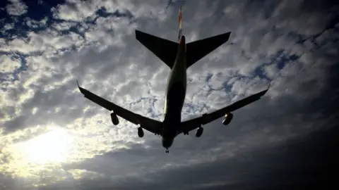 Getty Images Plane landing at Heathrow