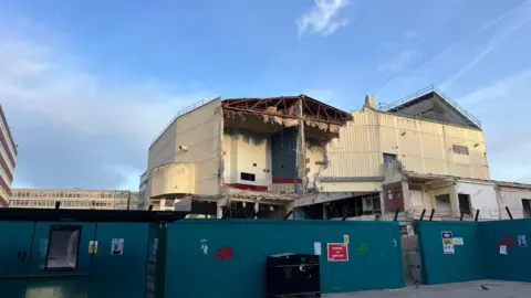 The Hollywood Cinema building at Anglia Square in Norwich has been partially demolished and has had the inside exposed by the work