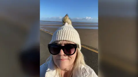 Christine Price Christine Price on the beach