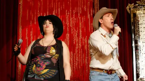 Getty Ruth Jones and Rob Brydon in characters as Nessa and Bryn from Gavin and Stacey, on the set of the 'Islands in the Stream' music video for Red Nose Day 2009