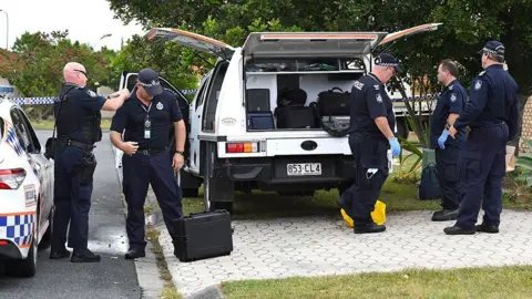 EPA Police are seen at the scene of a fatal stabbing at a Whitfield Crescent in the suburb of North Lakes, near Brisbane