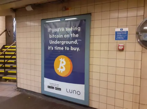 ASA/PA Media Advert on the London Underground saying "If you're seeing Bitcoin on the underground, it's time to buy"