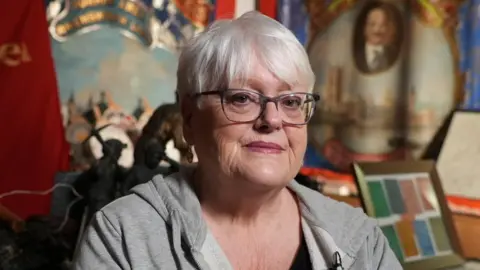 Mary Stratford with memorabilia from the strike