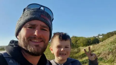 Christopher Rees Christopher and his son, Dylan 