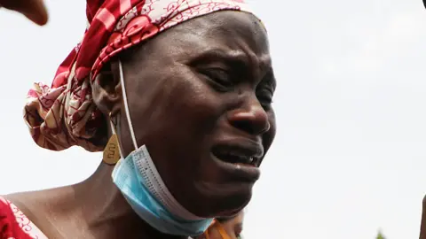 AFP A mother whose child was abducted in Nigeria this year- May 2021