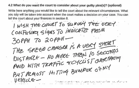PA Media A photo issued by HM Courts and Tribunals Service (HMCTS) of a note written by Lynda La Plante about confusing speeding and street signs. It reads: "I wish the court to survey the very confusing signs to indicate from 30pph to 20pph. The speed camera is a very short distance - no more than 10 seconds and with traffic & cyclists overtaking but almost hitting bumper of my vehicle."