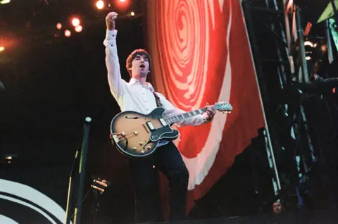 Getty Images Noel Gallagher on stage at Balloch