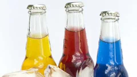 Getty Images The necks of alcopops